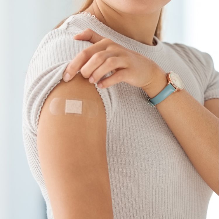 woman with bandaid on
